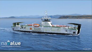 Modern white CMAL electric ferry, MV Isle of Islay, sailing in Scottish waters.