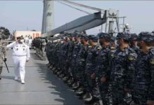 An Iranian Navy warship sails through open waters as part of a naval deployment.