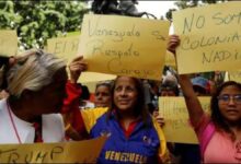 A massive oil tanker sails on the ocean, tied to the US-Venezuela dispute.