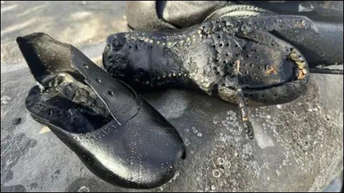 Several worn Victorian-era shoes from lost cargo discovered on Ogmore beach.