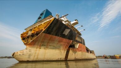 A large container ship at sea, representing Maersk's maritime decarbonization journey.