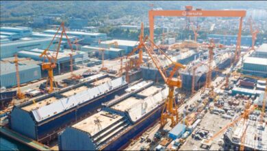 A large Very Large Gas Carrier (VLGC) ship displaying 'K-SHIP' on its hull.