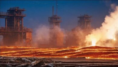 Molten hot metal pours from a blast furnace in a Chinese steel production facility.