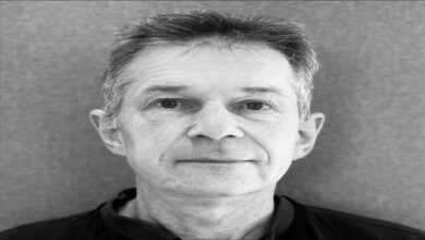 Convicted OW Bunker CFO Morten Skou stands outside, looking ahead seriously.