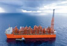 A large LNG-ready crude oil tanker, the M/T P. Marseille, sails at sea.