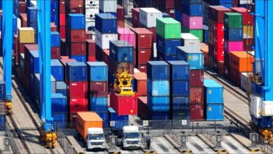 A large container ship sails on open waters, reflecting ZIM's new shipping service.