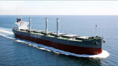 A large Oldendorff Carriers bulk carrier sails through blue ocean waters.