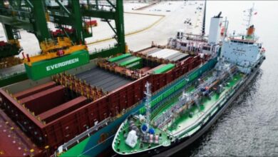 Large commercial vessel docked at a port, central to methanol bunkering supply chains.