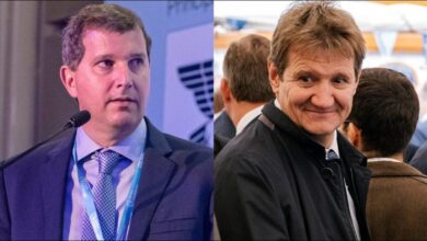 Ioannis Martinos of Signal Ocean and Gilbert Lan of AXSMarine stand together, related to the acquisition.