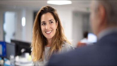 Diverse professionals collaborate in a modern office, representing Trafigura's global careers.