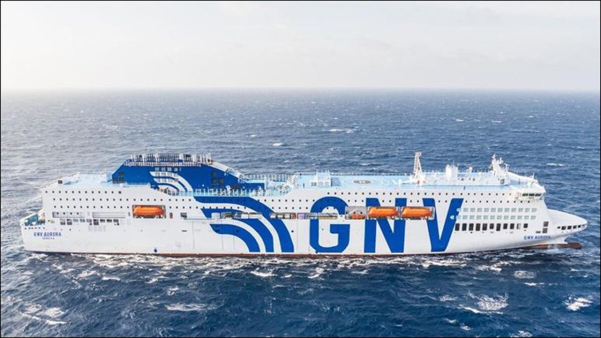 The GNV AURORA, a large white LNG-powered passenger ferry, sails on calm water.