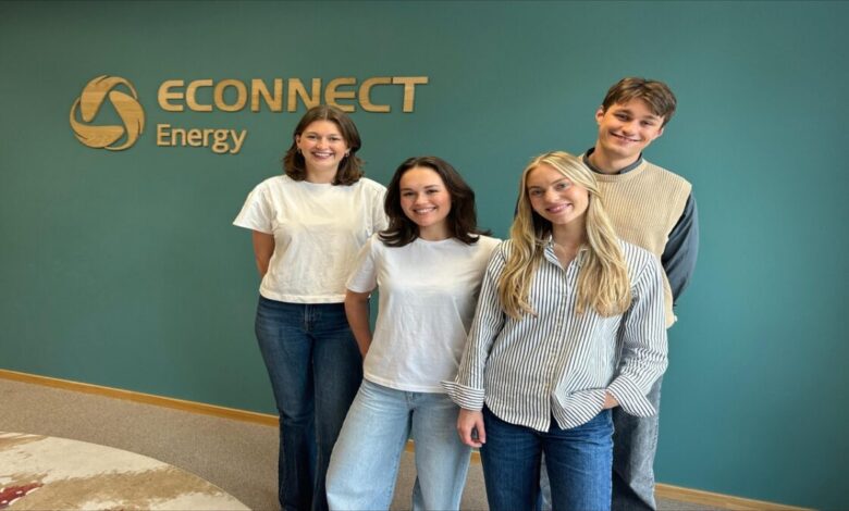 A large cargo ship navigating open water, representing LNG marine fuel and sustainable shipping.