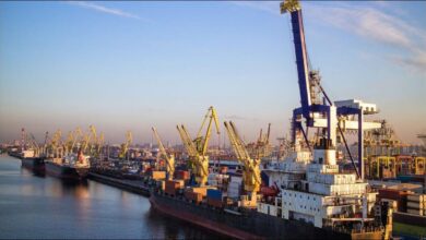 Ships docked in a busy port in Palau, a hub for maritime operations.