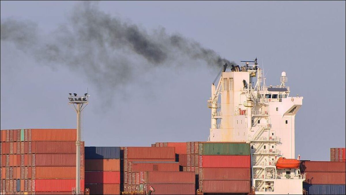 Large container ship sailing on the sea, symbolizing maritime carbon compliance costs.