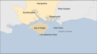 Shipping containers floating in rough seas near the Isle of Wight during Storm Goretti.