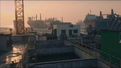 Workers dismantle a large vessel at a ship recycling yard in Chittagong, Bangladesh.
