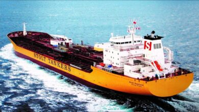 A large Stolt Tankers chemical tanker ship navigates open waters.