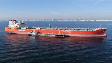 The bunkering tanker Eika Maru alongside the larger vessel Kohzan Maru VII during methanol transfer.