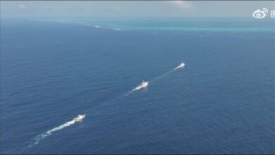 A white China Coast Guard vessel patrols waters in the contested South China Sea.