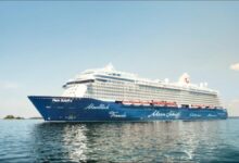 The TUI Cruises ship Mein Schiff 6 sails at sea.