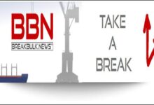 A large cargo ship navigates, symbolizing the marine fuel and global trade industry.