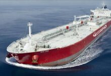 A large oil tanker ship sailing on the open sea, representing Scorpio Tankers' fleet operations.