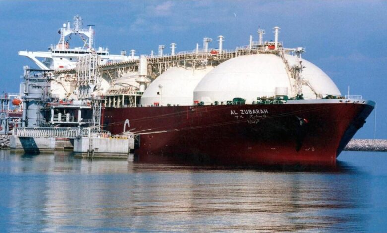 A large LNG tanker sails on the ocean, symbolizing global energy trade.