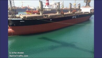 A large bulk carrier vessel, similar to the one arrested in Singapore, sails on the water.