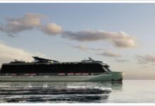 Meyer Turku's conceptual net-zero cruise ship, a sleek white vessel with large windows, sailing.