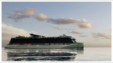 Meyer Turku's conceptual net-zero cruise ship, a sleek white vessel with large windows, sailing.