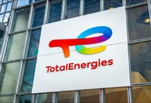 TotalEnergies LNG bunkering vessel operating in a port in Asia.