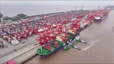 Shanghai port with modern ships, representing China's green fuel bunkering hub initiative.