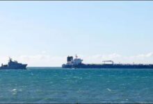 A large oil tanker, representative of the Russian 'shadow fleet', sails at sea.