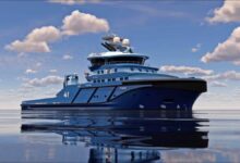 Ostensjo Rederi's new hybrid tugboat navigating calm waters.