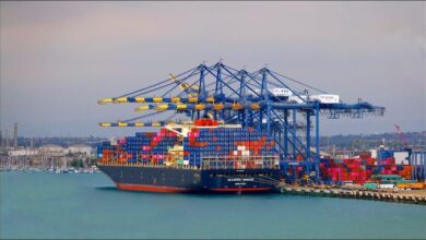Large container ship navigating the ocean, symbolizing international shipping and global trade.