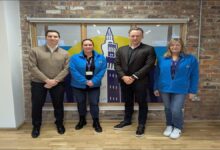 ABP representatives and young people at the Horizon Youth Zone construction site in Grimsby.