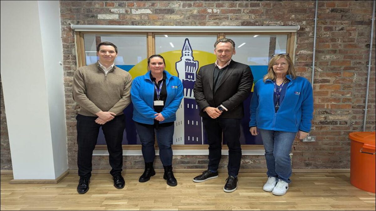 ABP representatives and young people at the Horizon Youth Zone construction site in Grimsby.