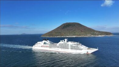Mitsui Ocean Cruises new ship sailing near Mount Fuji, Japan.