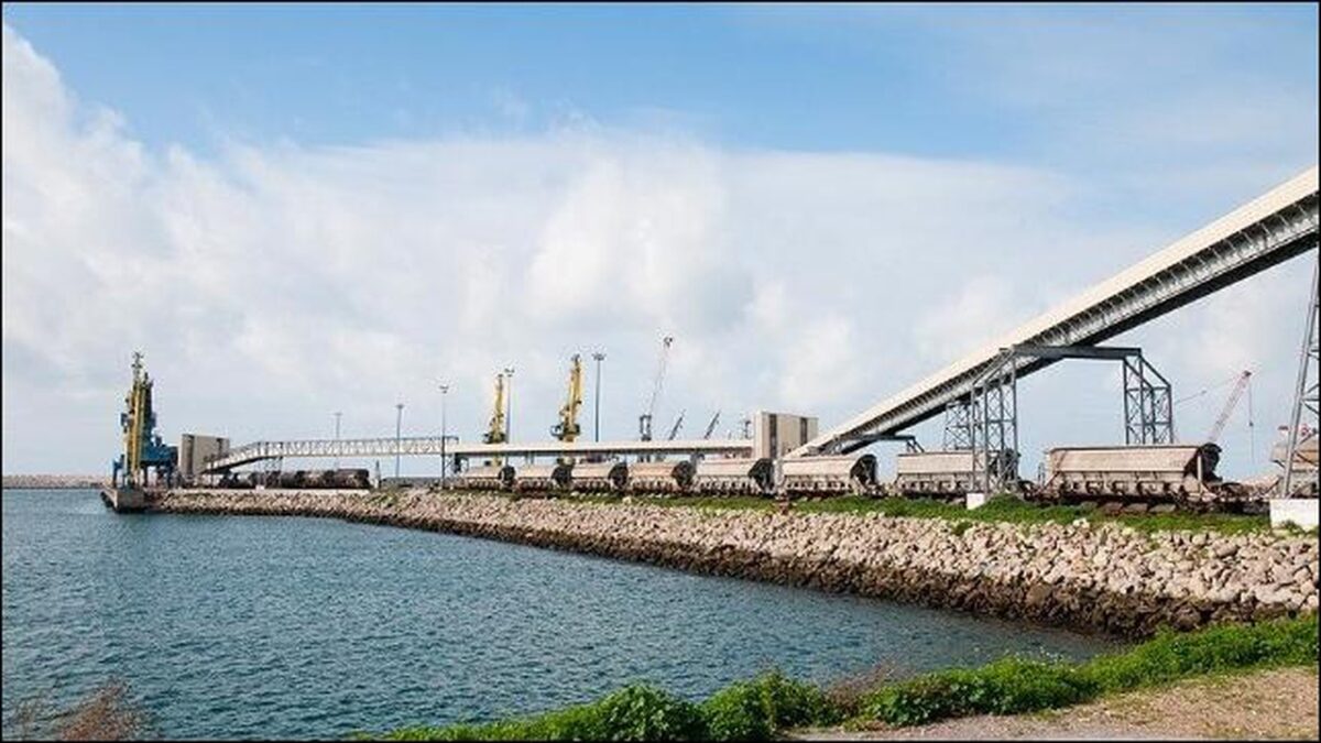 A.P. Moller Capital grain terminal in Morocco, with large silos and port infrastructure.