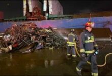 Firefighters extinguish a scrap metal fire on a bulker at the Port of Vancouver.