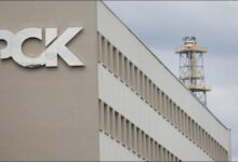 An industrial oil refinery representing German energy infrastructure and Rosneft assets.