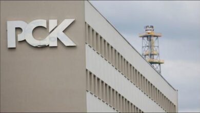 An industrial oil refinery representing German energy infrastructure and Rosneft assets.