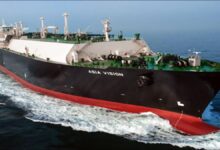 A large LNG tanker docked at Cheniere's Sabine Pass export terminal.