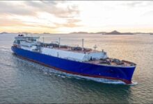 A large liquefied natural gas (LNG) carrier sailing on the open sea, representing the new order.