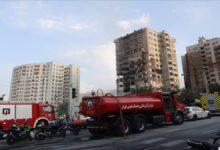A large oil tanker navigates a crucial shipping lane near the Strait of Hormuz.