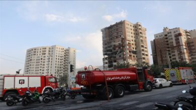 A large oil tanker navigates a crucial shipping lane near the Strait of Hormuz.