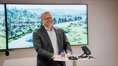 A Maersk container ship sailing at sea, transporting goods globally.