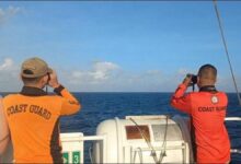 Philippine Coast Guard vessel searches during a maritime distress signal response.