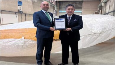 Seawing kite propulsion system deployed from a K Line cargo vessel at sea.