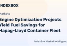 Large container ship sailing on the ocean, representing maritime fuel efficiency.